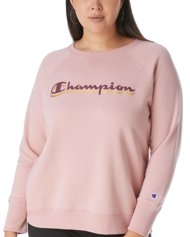 Front of a model wearing a size 1X Champion Women's Plus Powerblend Logo Boyfriend Sweatshirt Pink Size 1X in Pink by Champion. | dia_product_style_image_id:313674
